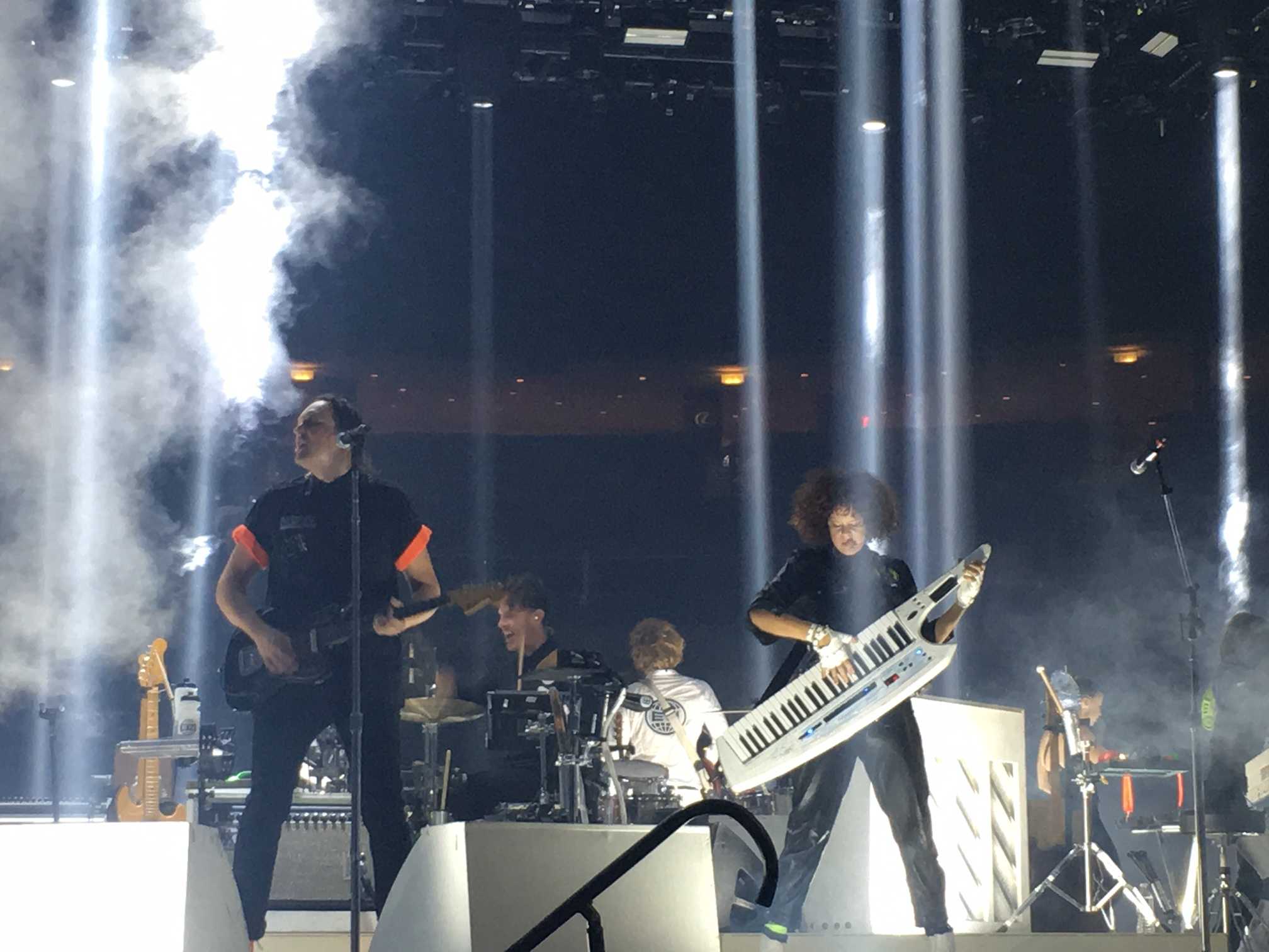 Arcade Fire's Live Performance Adds Grittiness to Their Music